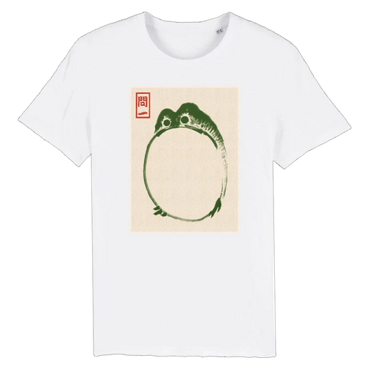 White t-shirt with a green frog graphic and red stamp on a beige background